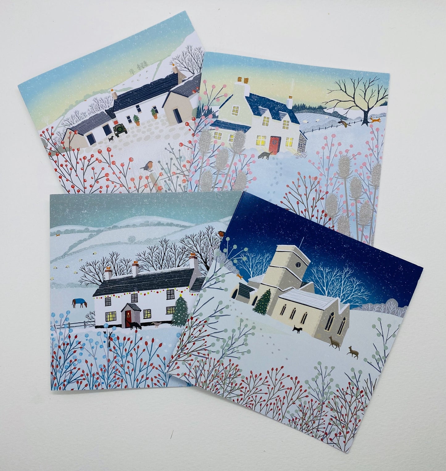 Pack of 4 Christmas cards, A Country Christmas. Cards from original art featuring cosy country scenes, designed and printed in Scotland