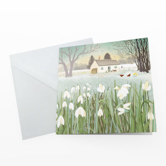 Snowdrop Croft Greetings Card: Frosty Winter Scene with a cottage and snowdrops, Caroline Smith Art