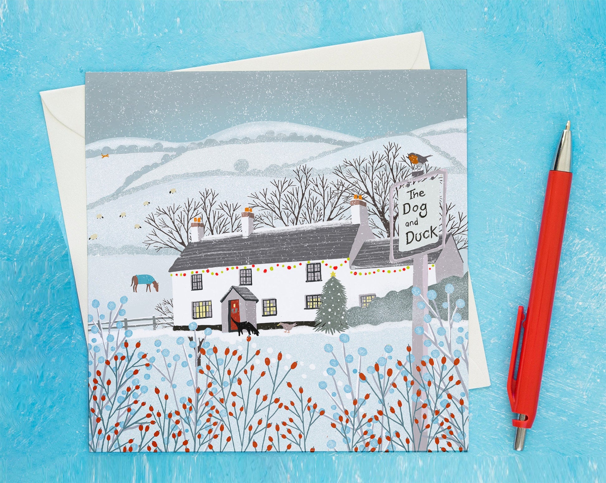 Christmas card, Dog & Duck Pub, A Country Christmas. Cards from original art featuring cosy country scenes, designed and printed in Scotland