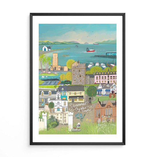 A framed art print featuring a colorful, hand-drawn illustration of Stranraer town with buildings, a harbor, and boats.